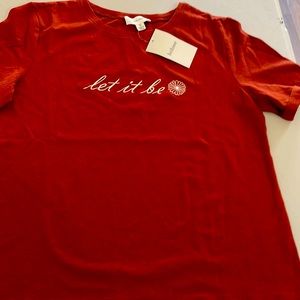 Bohme women’s T-shirt size small, and it says let it be on the front of it.